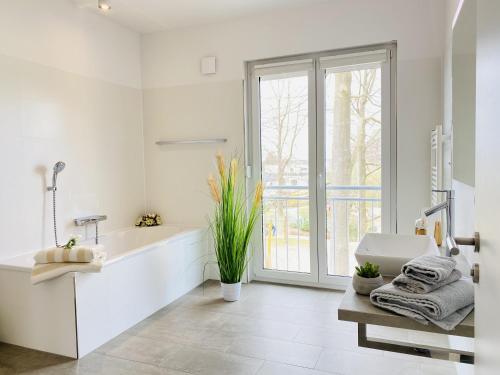 Фотография из галереи Ferienwohnung Backbord im Quartier Sellin в городе Остзебад-Зеллин