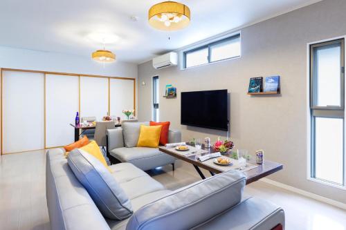Televisyen dan/atau pusat hiburan di Tsutsuji house