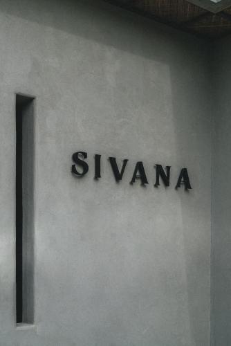 a sign on the side of a building at SIVANA, Hotel Boutique with ocean or garden views - Adults only in Uluwatu