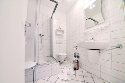 Ванная комната в Ferienwohnung "Seestern" in der Villa Odin Sellin