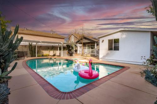 a swimming pool with a flamingo in a house at Modern Oasis with Pool & Jacuzzi near Universal Studios in Los Angeles