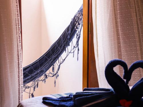 a reflection of a net in a mirror at Pousada Pura vida in Itacaré