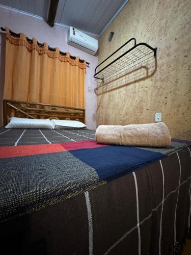 Postel nebo postele na pokoji v ubytování Chalé Orion