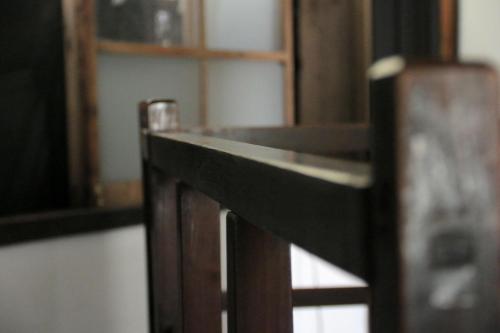 a close up of a wooden shelf in a room at ホテル宿かいふ in Kaiyo