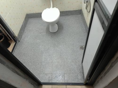 an overhead view of a bathroom with a toilet at Nuha Kulim Hitech Homestay Islamic in Kulim