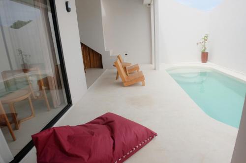 Πισίνα στο ή κοντά στο Noah Village Bali