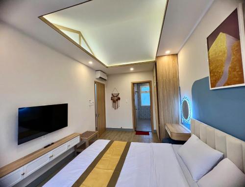 TV a/nebo společenská místnost v ubytování Novaworld phan thiet villa bao