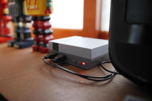 a video game system sitting on top of a table at Pyeongtaek 1981 in Pyeongtaek