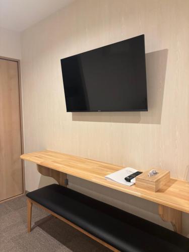 TV a/nebo společenská místnost v ubytování oni ga shi ma
