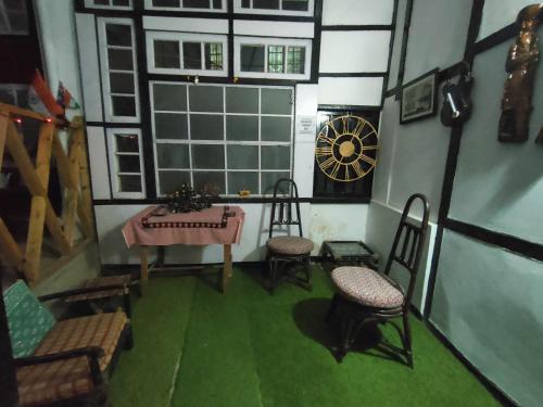 Posezení v ubytování Royal Pine Homestay