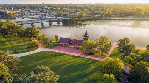 an aerial view of a building next to a river at Holiday Inn Express & Suites Chicago West - St Charles by IHG in Saint Charles