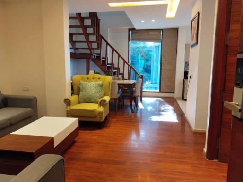 Ruang duduk di Holiday In Homestay