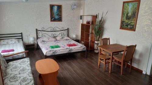 Postel nebo postele na pokoji v ubytování Мотель Хуторок