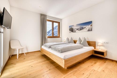 Postel nebo postele na pokoji v ubytování Damüls Appartements