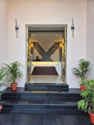 Hotel Adsan Heightsにあるベッド
