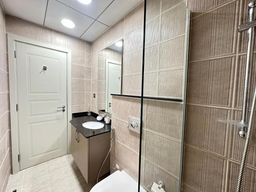 Koupelna v ubytování Stunning 1-Bedroom in The Polo Residence, Meydan