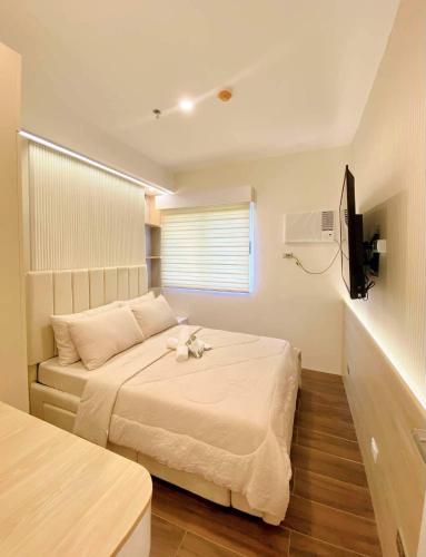 Llit o llits en una habitació de Matina Enclave