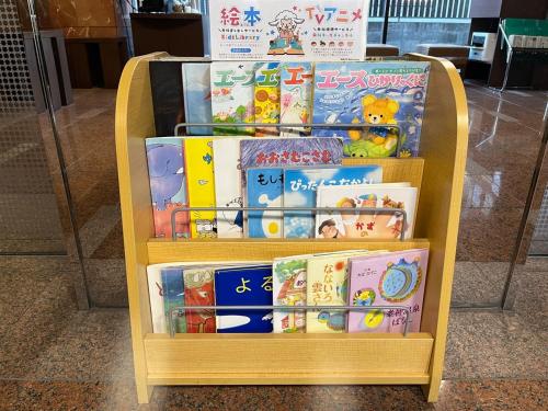 a display of books on a shelf in a store at Hotel Route-Inn Seibu Chichibu Ekimae in Chichibu