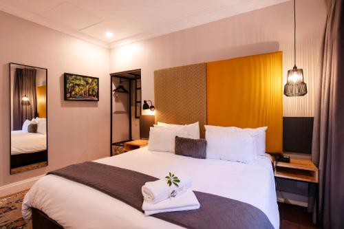 Katil atau katil-katil dalam bilik di Murray Street 137 Guesthouse