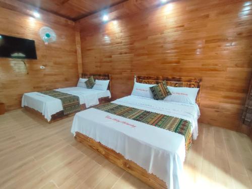 Postel nebo postele na pokoji v ubytování Homestay Tuấn Hưng Mèo Vạc