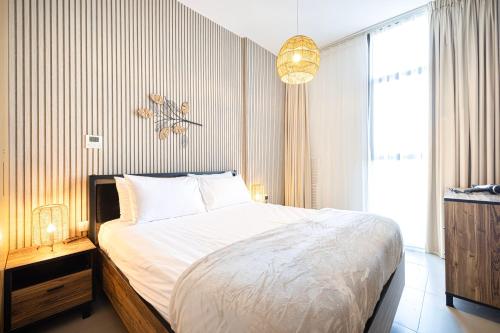 Postel nebo postele na pokoji v ubytování Wonderful Whole Apartment in Sharjah - Aura