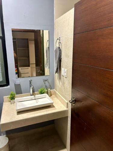 Ένα μπάνιο στο Departamento torre 809