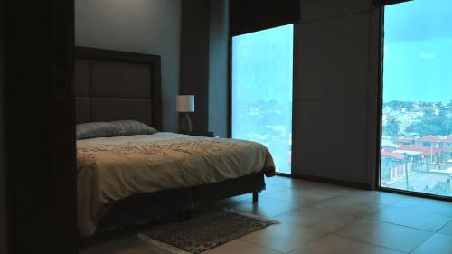 Ένα ή περισσότερα κρεβάτια σε δωμάτιο στο Departamento torre 809