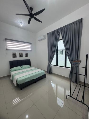 Cama o camas de una habitación en De'Laman Homestay beranang
