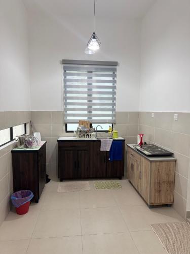 Una cocina o zona de cocina en De'Laman Homestay beranang