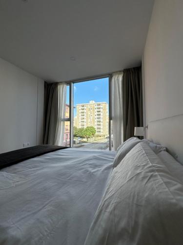 En eller flere senge i et værelse på The city charm