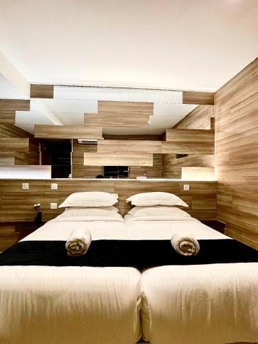 Кровать или кровати в номере Hotel Villa