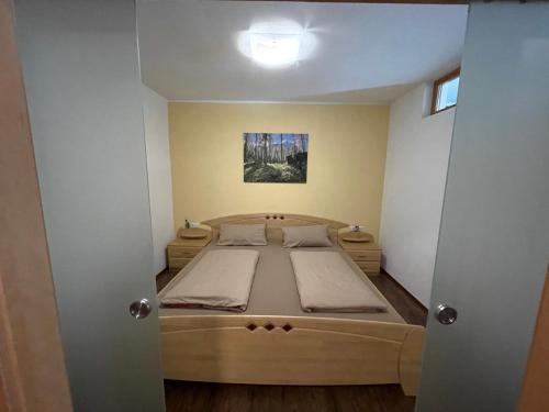 a bedroom with a large bed in a room at Wonder & Wander in Ehrwald