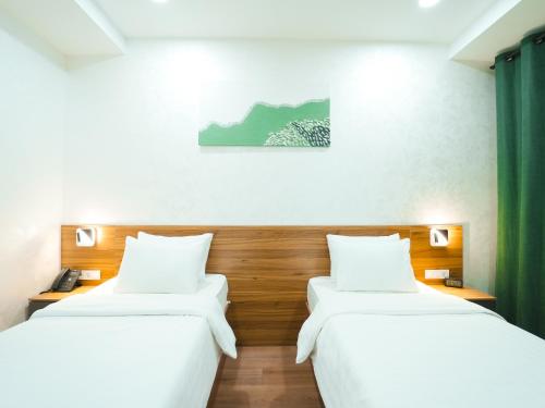 Katil atau katil-katil dalam bilik di Avant Hotel Tashkent Pool&Spa