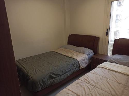 Katil atau katil-katil dalam bilik di High standard apartment Madinaty