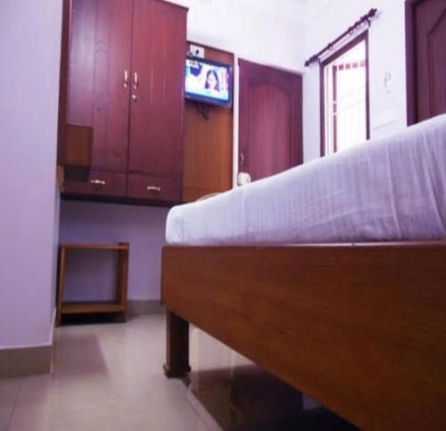 TV a/nebo společenská místnost v ubytování Nest Budget Inn