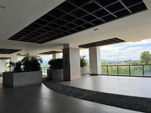 an empty lobby with a view of a building at K Avenue High Floor Studio Balcony with Sunrise View in Kota Kinabalu