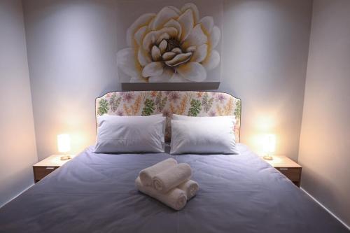 Кровать или кровати в номере Modern One Bedroom In The Warwick