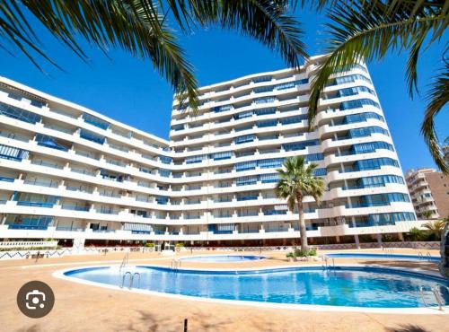 Πισίνα στο ή κοντά στο Turquesa Beach Cozy apartment with sea view