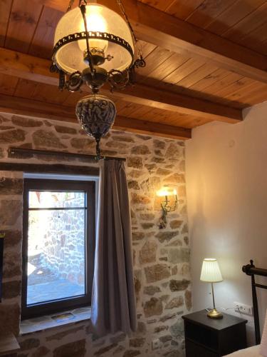 Ένα ή περισσότερα κρεβάτια σε δωμάτιο στο Annousa's House & Studios