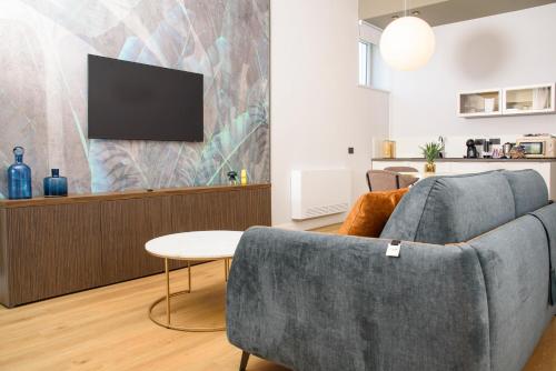 TV a/nebo společenská místnost v ubytování Vesuvius Palace Aparthotel