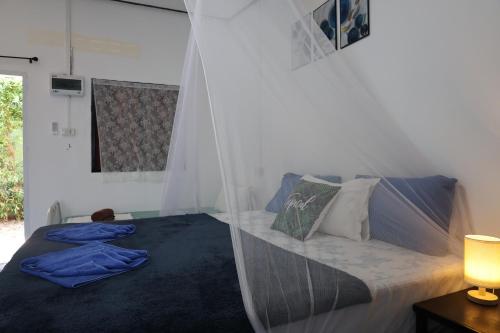 Ένα ή περισσότερα κρεβάτια σε δωμάτιο στο Long beach simple House