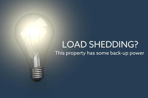 a light bulb with the words load shedding at Villa Alexa in Cape Town