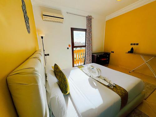 CHAY - Appartements a Ouarzazateにあるベッド