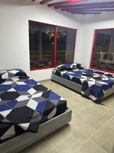 Postel nebo postele na pokoji v ubytování Villa Osorio