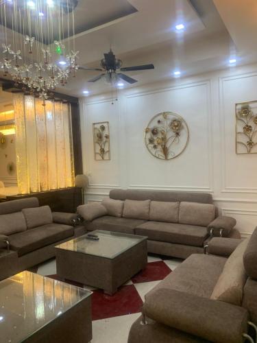 Χώρος καθιστικού στο Aravali Residency Kharkhoda