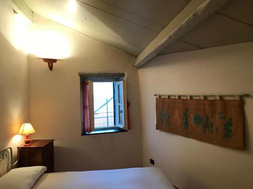 Una cama o camas en una habitación de Appartamento Vico del Limone