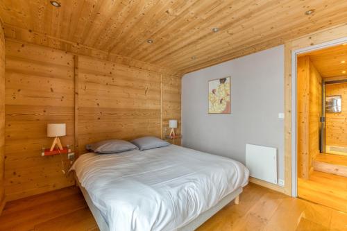 Katil atau katil-katil dalam bilik di Le Flocon Grand Chalet 4 étoiles