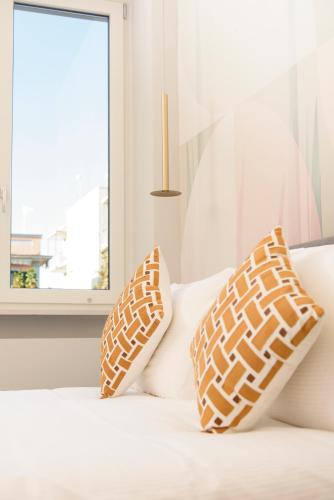 Postel nebo postele na pokoji v ubytování Vesuvius Palace Aparthotel