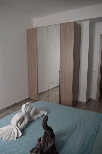 Ένα ή περισσότερα κρεβάτια σε δωμάτιο στο SGC Boa Vista Apartments