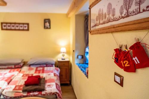 a bedroom with a bed at Ciesa del Selmo Faure in Sottoguda
